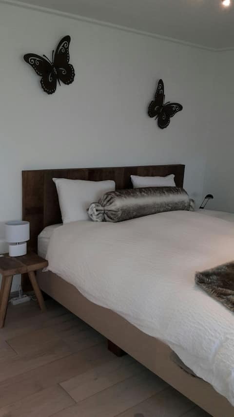 Cozy spacious farmhouse bedroom