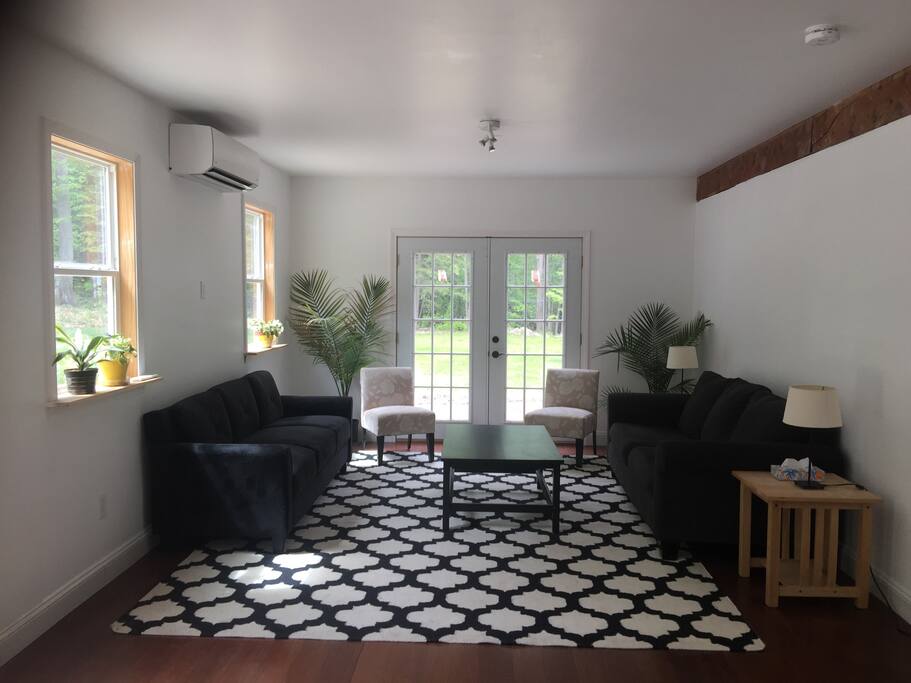 Living Room: The common area is designed in an open space concept. The guest living room has seating for 12 people. A lending library of books and games is also available upon request.