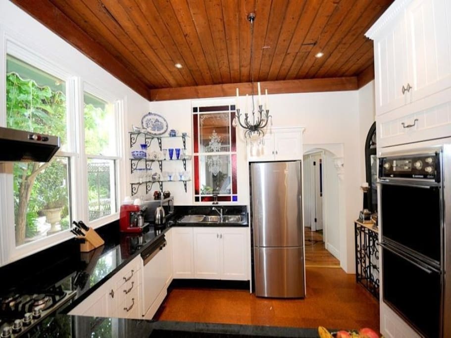 The kitchen looks out to the courtyard and adjoins the conservatory