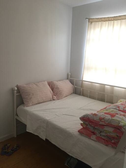 Full Sized Bed. Not shown here, but new Air Conditioner has been installed. Perfect and ready for the summer guests!