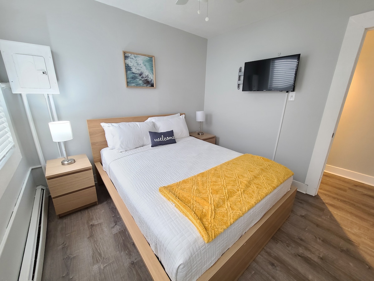 Bedroom featuring Queen Sized Bed and Smart TV