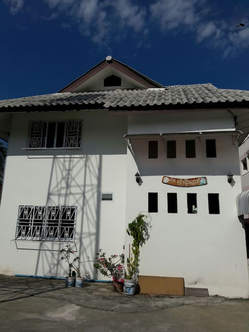 In front of building