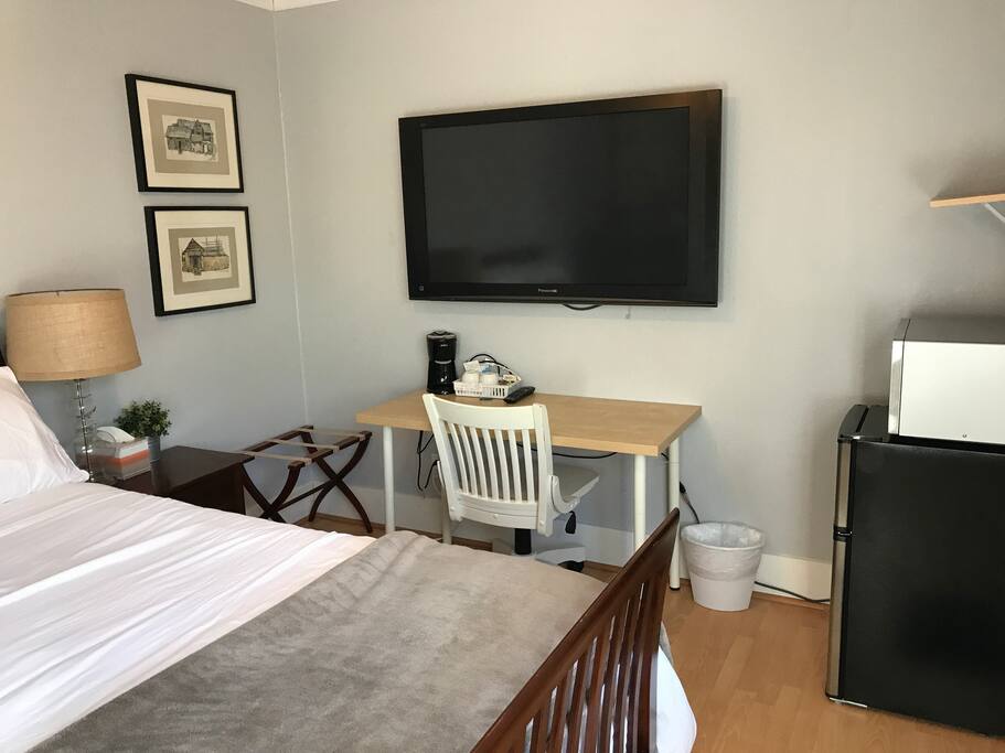 Business Area - Desk, Coffee, Flat Panel TV with Roku or Cables for Connecting to your PC or Mac and Small Refrigerator with Separate Freezer and Microwave
