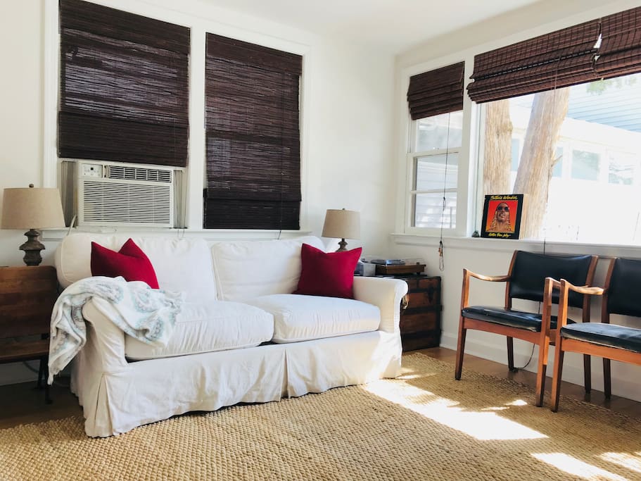 Sunlit living room feat. Stevie Wonder. Enjoy records, reading or Roku!
