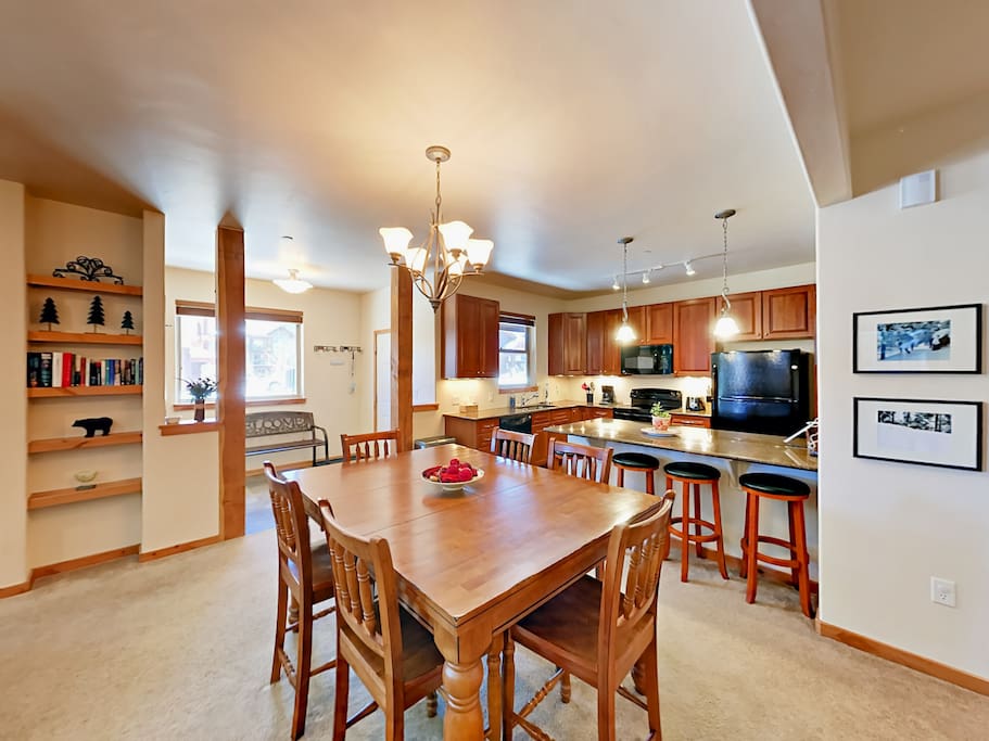 There is plenty of seating between the dining area and kitchen bar.