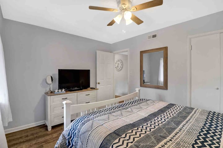 Bedroom 1 features queen size bed and t.v. with access to basic cable