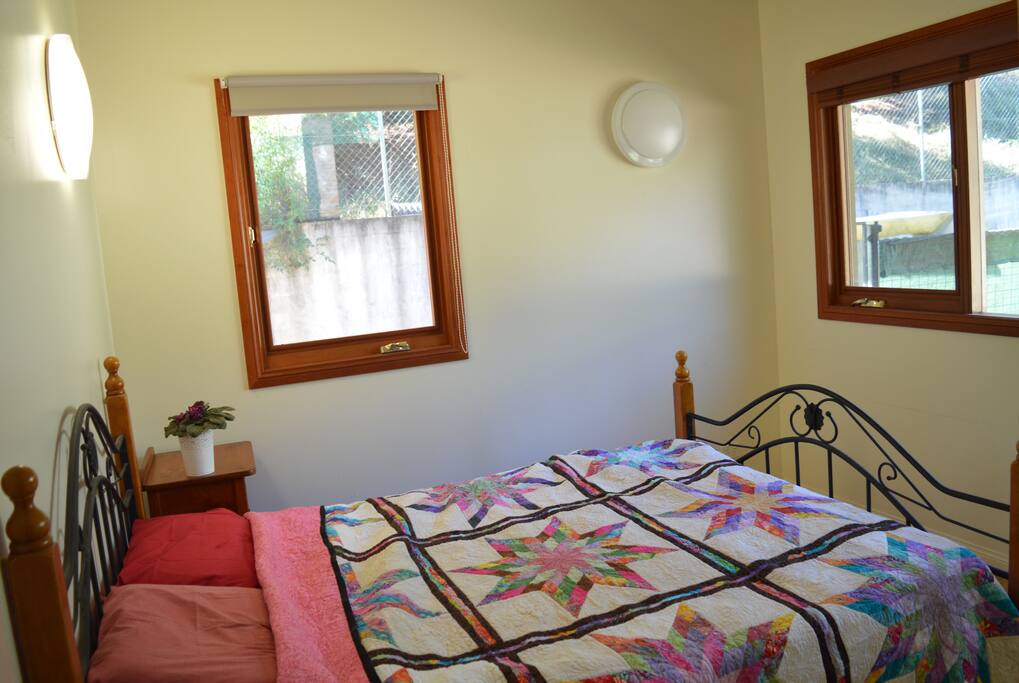 Room 1 - Cosy double bed and a wardrobe with mirror