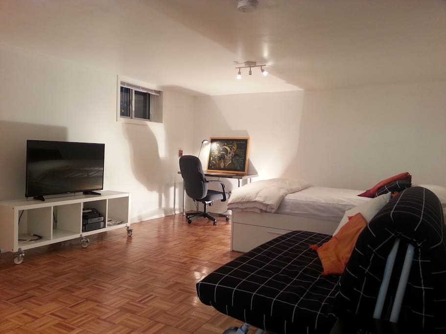 Cosy sofa and computer desk. No TV.