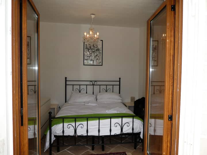 Looking into the main bedroom from the patio