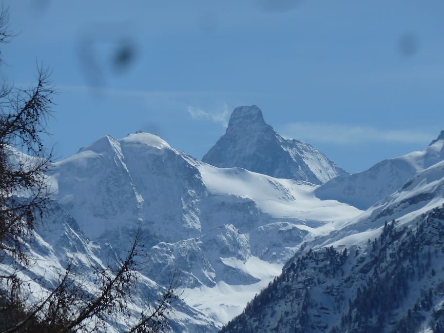 The view of the Cervin enjoyable from all the rooms in the chalet on a clear-sky sunny day..