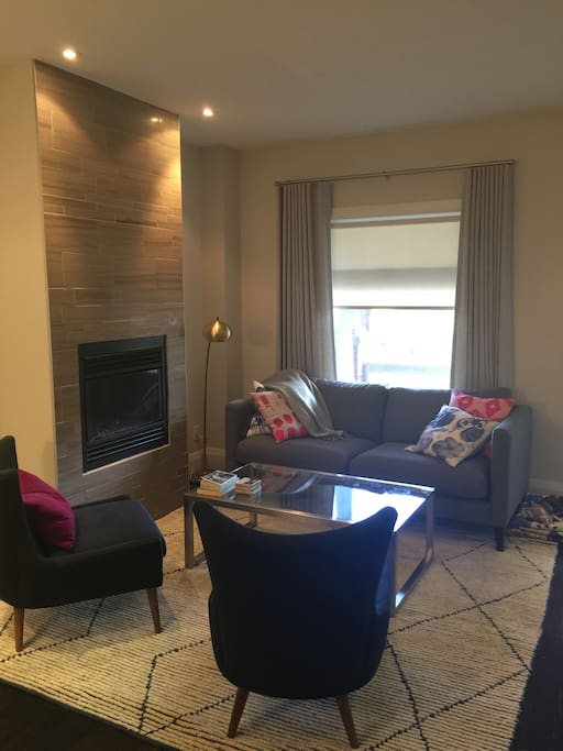 Comfortable living area on main floor, with gas fireplace