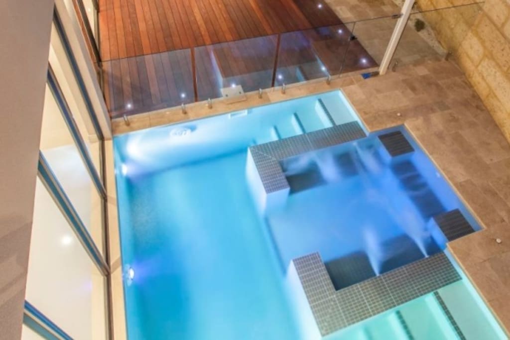 Plunge pool with Jacuzzi and hydrotherapy jet seen from second storey entertainment area