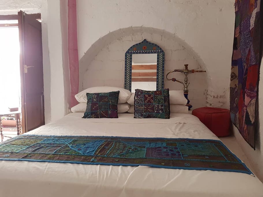 Large bedroom 3 beds sleeps 5 people , balcony and private bathroom