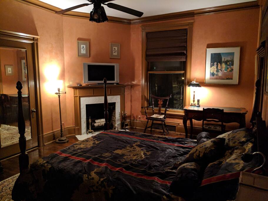 This delightful bedroom has a commanding view of the garden.