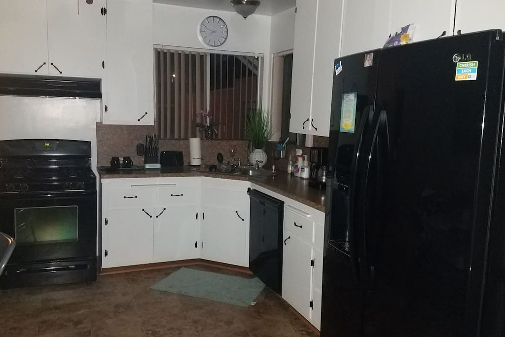 Full stocked kitchen. Dishes , pots and pans silverware. microwave blender, coffee maker