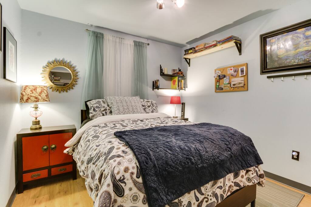 Bedroom 2, no window and full size bed.