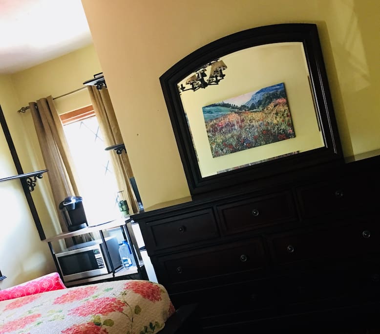 Dresser for storage. It also holds the towels and wash cloths for our guests.