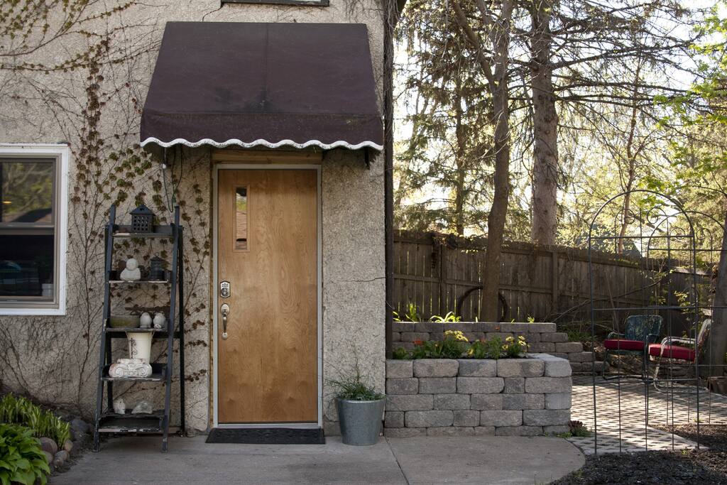 Welcome to my home! Your entrance is thru the back fence gate off your own parking spot in the driveway.