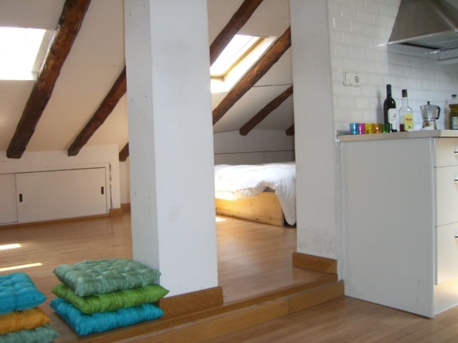 View from living room into bedroom and sitting area - 2 skylights.