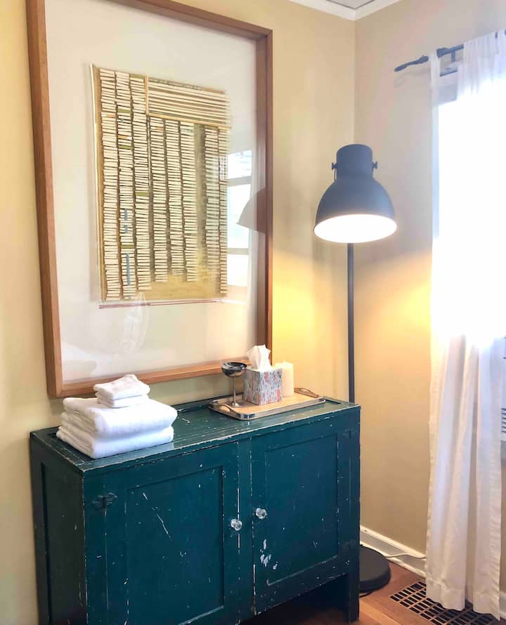 Fresh linens and original artwork.