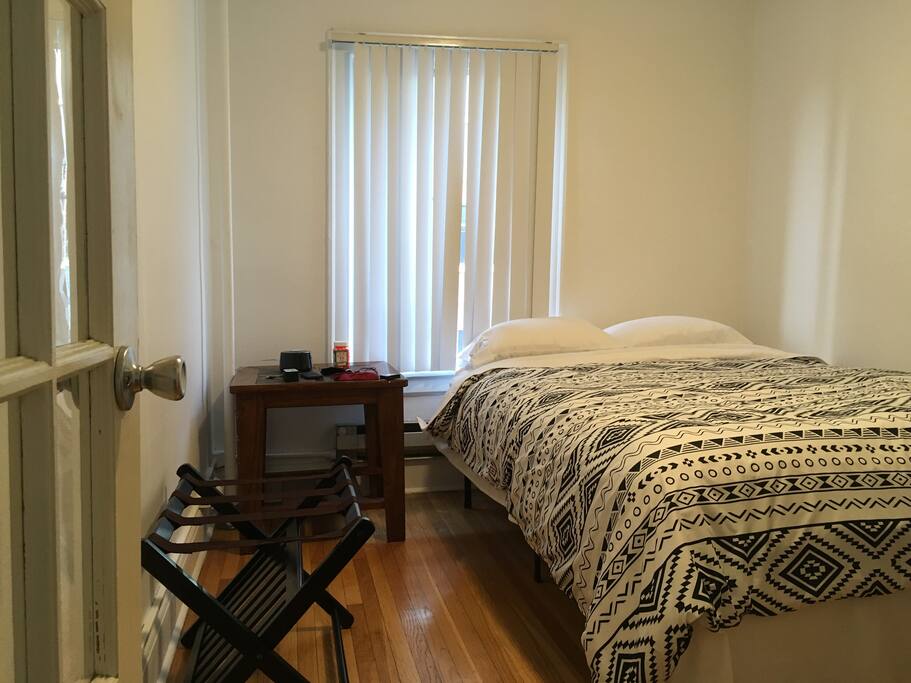 Well-furnished bedroom with various amenities