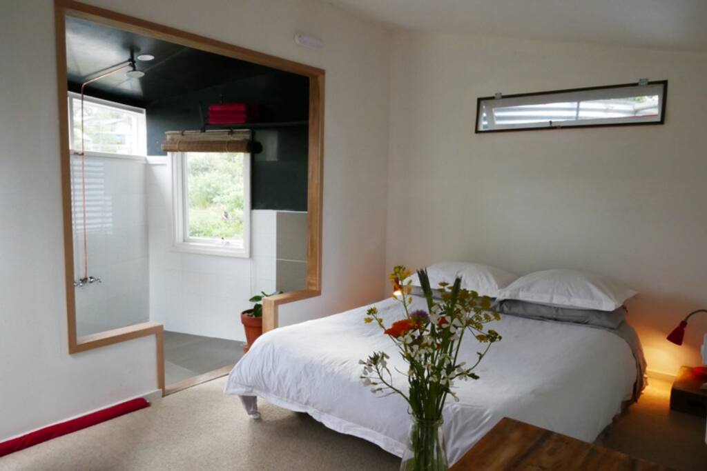 Bed and ensuite shower room.