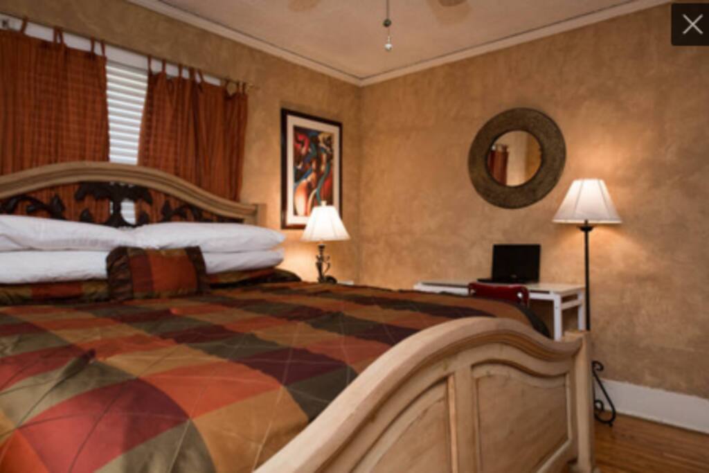 California King sized bed. Flat screen TV. Desk for laptop use.