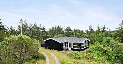 Cozy holiday home with fjord views by the North Sea