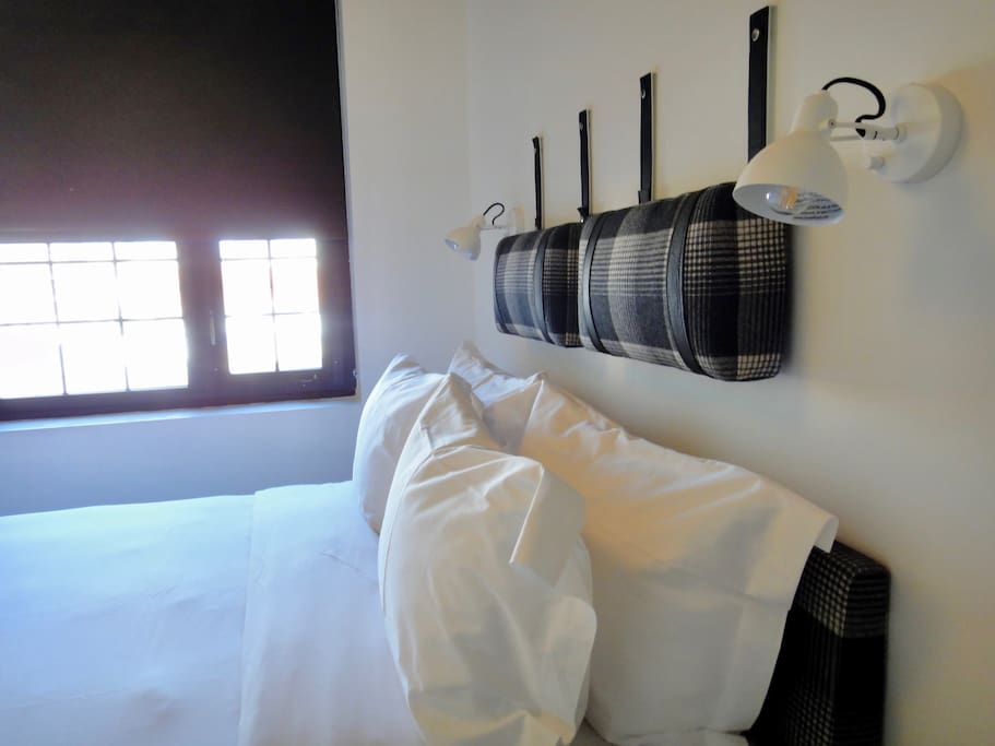 Leather Trimmed Cushions, Frette Linen, Down Pillows and Cozy Down Comforter