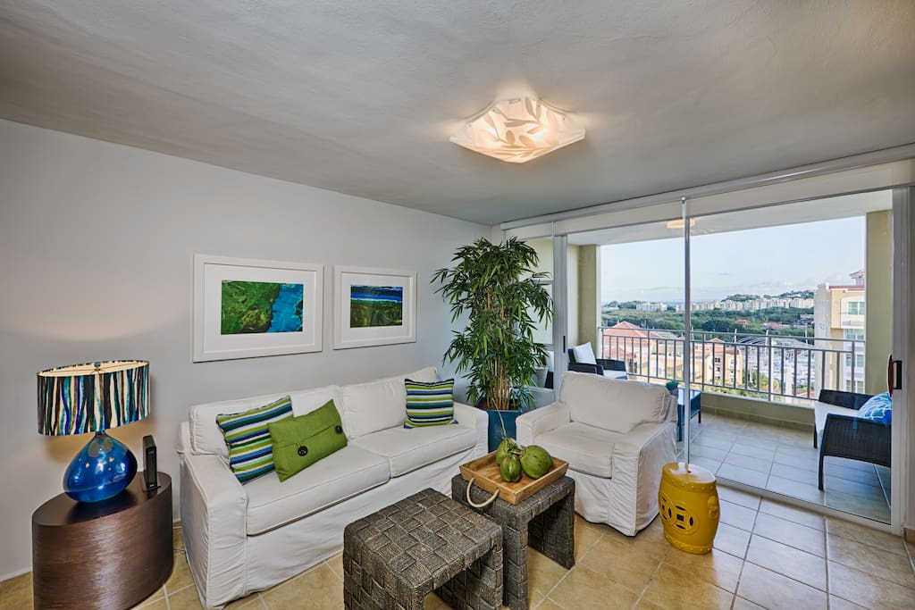 Living room with great views of the marina and lush tropical gardens