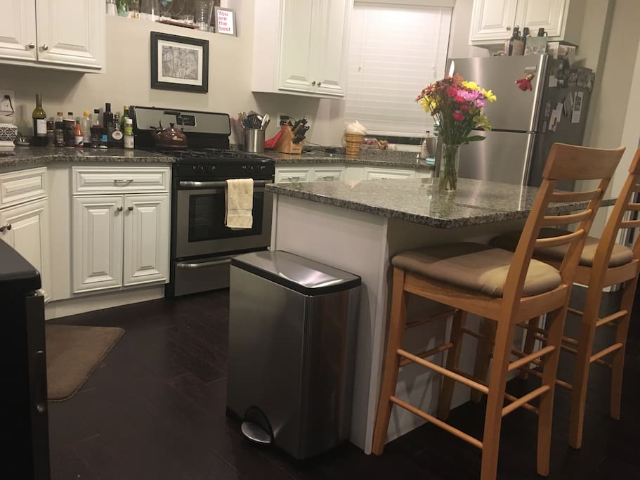 The kitchen is fully equipped with cooking and baking essentials for your comfort.