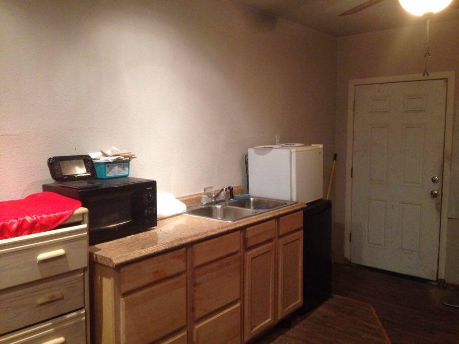 Front Entrance. Double Mini Fridges. Kitchen,Microwave. Space Below this image is the Gym Pic.