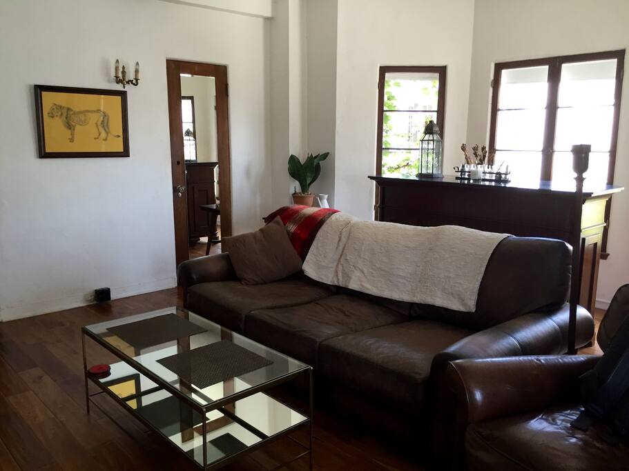 Deep comfy leather sofa and bar