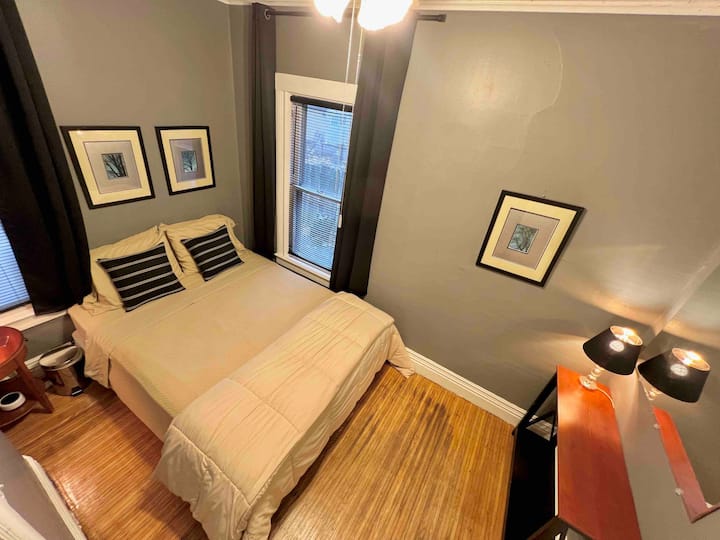 The second bedroom is also equipped with blackout curtains and a sound machine and decorated in the colors of the moment. Not pictured: the view of the bird feeder just outside the window!
