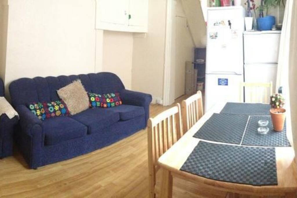 Shared lounge with a dinning table and 4 chairs