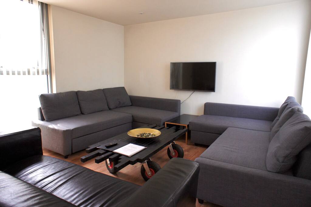 Here's your living room with two double sofa-beds