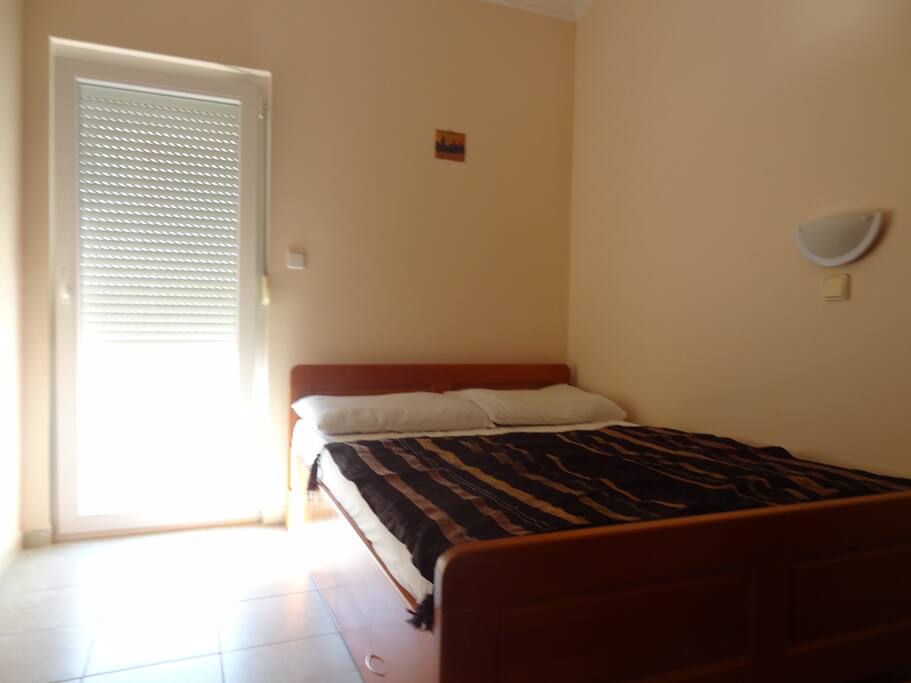 bedroom with private balcony