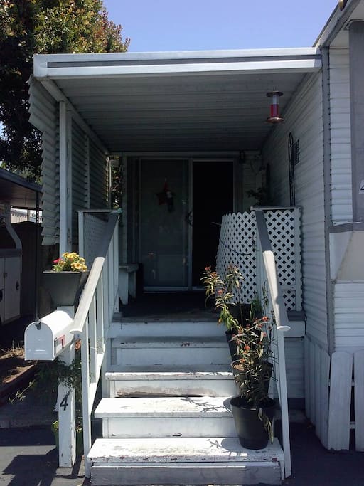Front porch can be secured with additional front gate if necessary to fence in little ones :)
