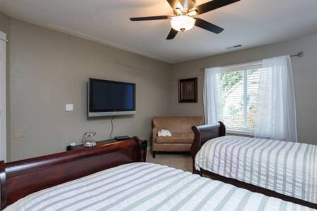 TV with streaming video and all channels. Comfy leather loveseat