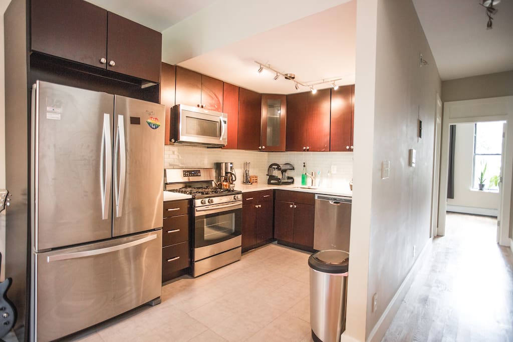 One of our 2 newly remodeled kitchens fully equipped with high-end appliances