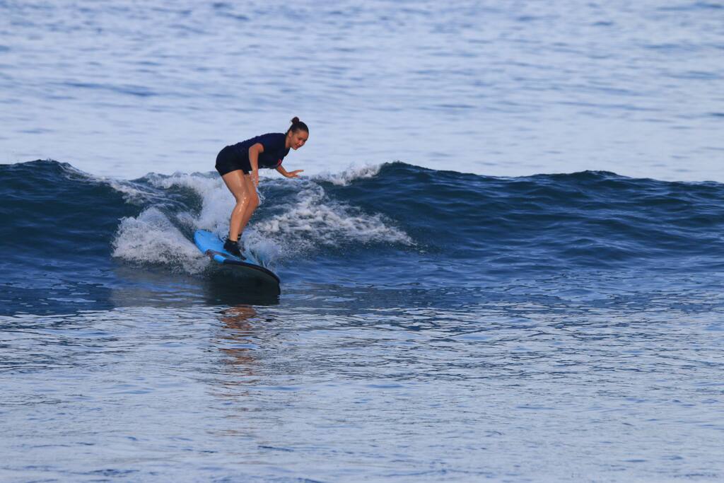 Learn to surf in front of hotel.