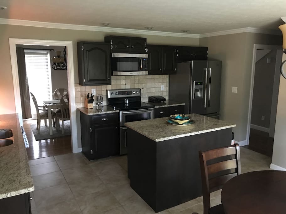 Kitchen with island, facing the dining room area