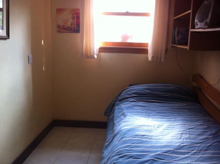 Small adjoining room (part of the same unit). Roll out bed