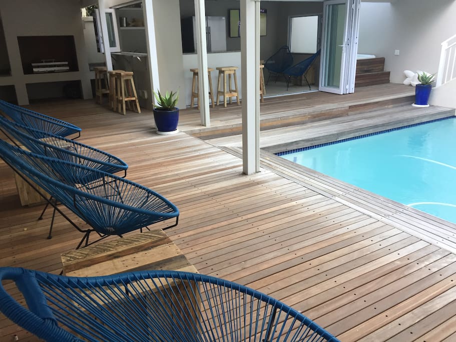 Braai area and entertainment courtyard leading out from living area and kitchen