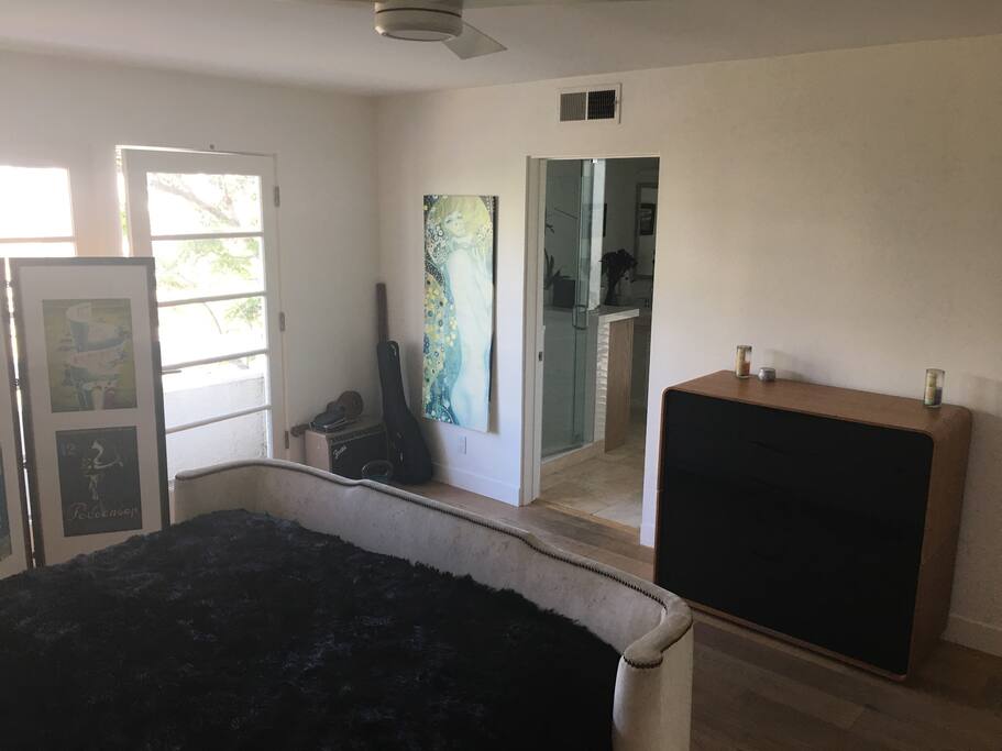 Door to balcony overlooking canal, private bath