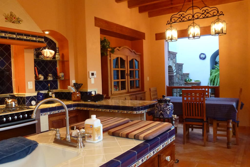 Kitchen dining area with view of atrium