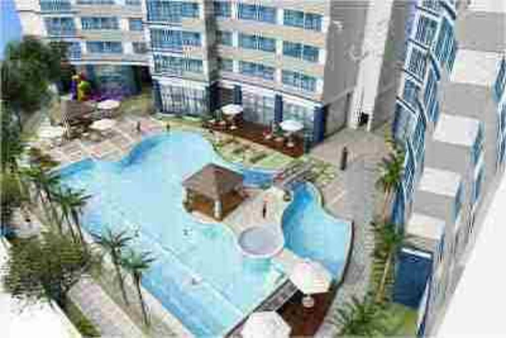 Lagoon style swimming pool with 2 lap lanes
