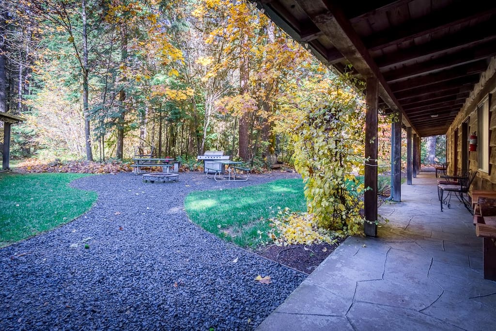Private courtyard with fire pit and bbqs, view from kitchen door. We supply the firewood for your campfires! Lots of camp chairs available too!