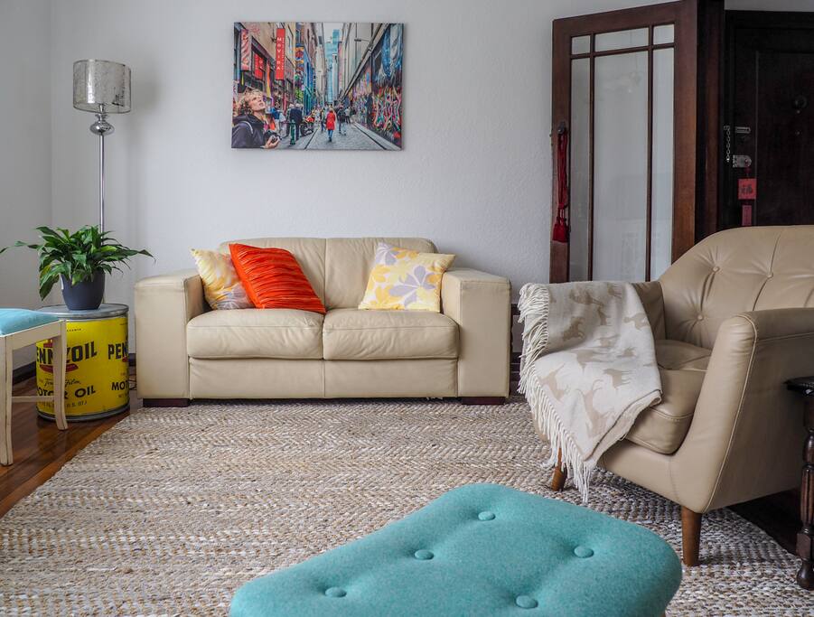 Two seater leather lounge in the living room.