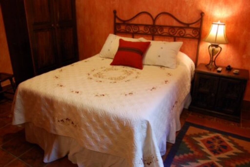 Lovely bedroom with enough space for a couple.